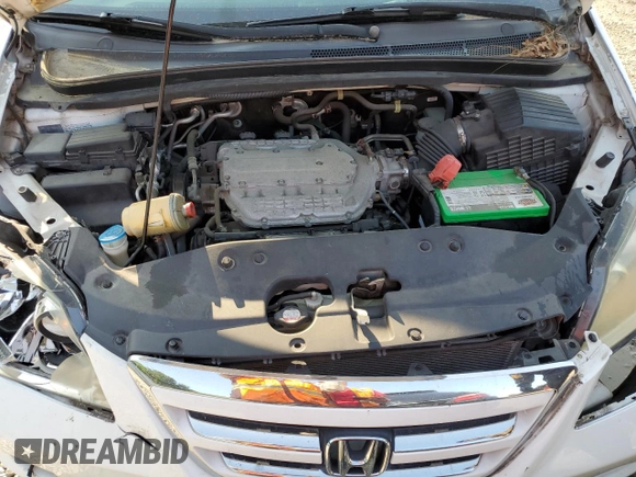 2007 Honda Odyssey EX с VIN 5FNRL38497B034764, выставлен на аукционе Copart как лот 58607635 с пробегом 77 028 миль миль и Чистый • Clean title. История ставок и продаж доступна на DreamBid. Изображение 14.
