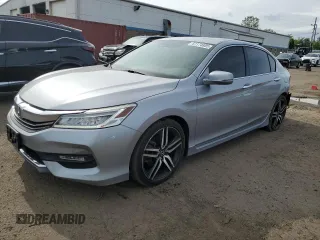 2017 Honda Accord Touring with VIN 1HGCR3F95HA035327, listed as a Copart auction lot 61174805 with 75,962 mi miles and Salvage title. Bid and sale history available at DreamBid. Image 1.