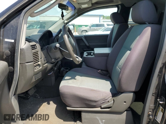 2006 Nissan Titan SE z VIN 1N6BA06A66N569501, wystawiony jako Copart lot #59872455 z przebiegiem 80 057 mil mil oraz Szkoda całkowita • Salvage title. Historia ofert i sprzedaży dostępna na DreamBid. Obrazek 7.
