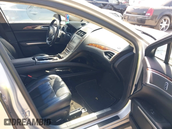 2015 Lincoln MKZ with VIN 3LN6L2J97FR608175, listed as a IAAI auction lot 41860094 with 196,965 mi miles and . Bid and sale history available at DreamBid. Image 5.