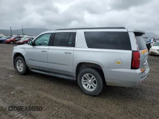 2019 Chevrolet Suburban LT z VIN 1GNSKHKC0KR397479, wystawiony jako Copart lot #56206065 z przebiegiem 289 466 mil mil oraz Czysty tytuł • Clean title. Historia ofert i sprzedaży dostępna na DreamBid. Obrazek 2.