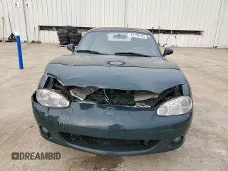 2001 Mazda MX-5 Miata z VIN JM1NB353810212392, wystawiony jako Copart lot #44398295 z przebiegiem 88 601 mil mil oraz Szkoda całkowita • Salvage title. Historia ofert i sprzedaży dostępna na DreamBid. Obrazek 5.