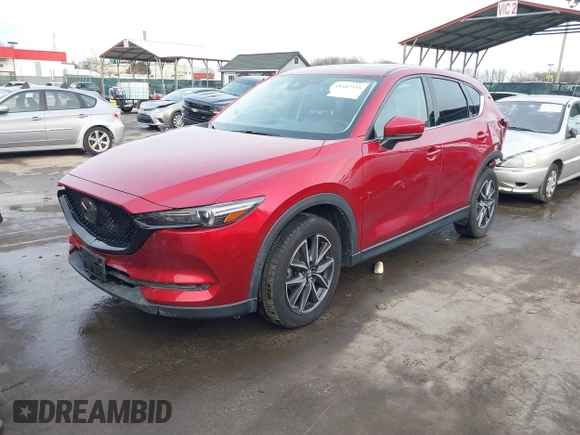 2018 Mazda CX-5 Grand Touring with VIN JM3KFBDM8J0406276, listed as a IAAI auction lot 41447355 with 70,772 mi miles. Bid and sale history available at carsss.com. Image 2.
