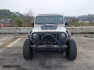 2007 Jeep Wrangler Unlimited X with VIN 1J4GA391X7L107424, listed as a IAAI auction lot 41752013 with 196,557 mi miles. Bid and sale history available at carsss.com. Image 12.