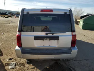 2008 Jeep Commander Sport z VIN 1J8HH48KX8C105432, wystawiony jako Copart lot #86000854 z przebiegiem 201 869 mil mil oraz Szkoda całkowita • Salvage title. Historia ofert i sprzedaży dostępna na DreamBid. Obrazek 6.