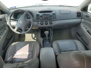 2002 Toyota Camry XLE z VIN 4T1BF32K12U519069, wystawiony jako Copart lot #55501405 z przebiegiem 186 142 mil mil oraz Szkoda całkowita • Salvage title. Historia ofert i sprzedaży dostępna na DreamBid. Obrazek 8.