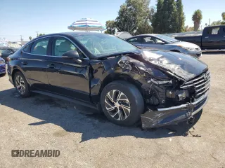 2022 Hyundai Sonata Hybrid Blue with VIN KMHL24JJ9NA041424, listed as a Copart auction lot 70693204 with 32,689 mi miles and Salvage Title. Bid and sale history available at carsss.com. Image 4.