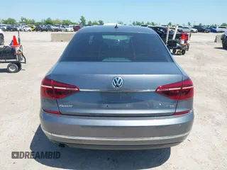 2017 Volkswagen Passat S z VIN 1VWAT7A37HC069014, wystawiony jako IAAI lot #41967310 z przebiegiem 109 266 mil mil oraz . Historia ofert i sprzedaży dostępna na DreamBid. Obrazek 16.