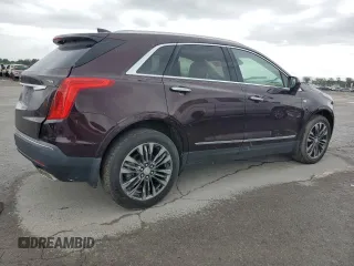 2018 Cadillac XT5 Premium Luxury FWD z VIN 1GYKNERS5JZ127703, wystawiony jako Copart lot #58315215 z przebiegiem Nie podano mil oraz Szkoda całkowita • Salvage title. Historia ofert i sprzedaży dostępna na DreamBid. Obrazek 3.