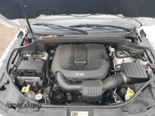 2014 Jeep Grand Cherokee Overland with VIN 1C4RJFCG7EC572298, listed as a Copart auction lot 83970004 with 104,861 mi miles and Salvage Title. Bid and sale history available at DreamBid. Image 13.