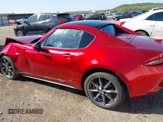 2020 Mazda MX-5 Miata Grand Touring z VIN JM1NDAM77L0418499, wystawiony jako IAAI lot #42010802 z przebiegiem 19 588 mil mil oraz . Historia ofert i sprzedaży dostępna na DreamBid. Obrazek 14.