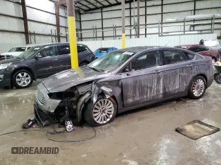 2013 Ford Fusion SE Hybrid z VIN 3FA6P0LU9DR305772, wystawiony jako Copart lot #45698955 z przebiegiem Nie podano mil oraz Szkoda całkowita • Salvage title. Historia ofert i sprzedaży dostępna na DreamBid. Obrazek 1.