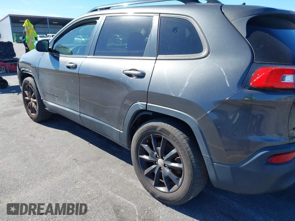 2014 Jeep Cherokee Latitude with VIN 1C4PJMCS3EW298340, listed as a IAAI auction lot 41708488 with 217,438 mi miles and . Bid and sale history available at DreamBid. Image 18.