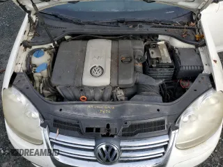 2007 Volkswagen Jetta z VIN 3VWRF31K87M001148, wystawiony jako Copart lot #86141414 z przebiegiem 301 105 mil mil oraz Czysty tytuł • Clean title. Historia ofert i sprzedaży dostępna na DreamBid. Obrazek 11.