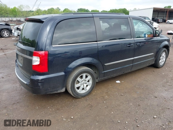 2011 Chrysler Town & Country Touring with VIN 2A4RR5DG7BR641411, listed as a IAAI auction lot 42090973 with 158,298 mi miles and . Bid and sale history available at DreamBid. Image 4.