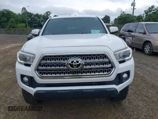 2017 Toyota Tacoma SR5 z VIN 5TFCZ5AN9HX115659, wystawiony jako IAAI lot #42375002 z przebiegiem 105 170 mil mil oraz . Historia ofert i sprzedaży dostępna na DreamBid. Obrazek 12.