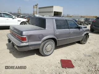1993 Dodge Dynasty z VIN 1B3XC4638PD195963, wystawiony jako Copart lot #49120625 z przebiegiem 86 825 mil mil oraz Szkoda całkowita • Salvage title. Historia ofert i sprzedaży dostępna na DreamBid. Obrazek 3.