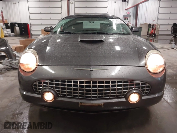 2003 Ford Thunderbird Deluxe z VIN 1FAHP60A53Y113819, wystawiony jako IAAI lot #41724732 z przebiegiem Nie podano mil oraz . Historia ofert i sprzedaży dostępna na DreamBid. Obrazek 13.