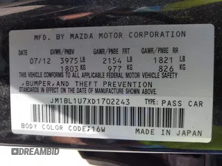 2013 Mazda 3 i Sport with VIN JM1BL1U7XD1702243, listed as a IAAI auction lot 42001182 with 115,257 mi miles and . Bid and sale history available at DreamBid. Image 9.
