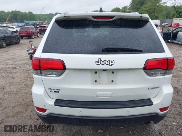 2021 Jeep Grand Cherokee Laredo E with VIN 1C4RJFAG7MC620710, listed as a IAAI auction lot 42255694 with 51,989 mi miles and . Bid and sale history available at DreamBid. Image 17.