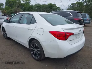 2017 Toyota Corolla L z VIN 2T1BURHE8HC787010, wystawiony jako IAAI lot #42366723 z przebiegiem 104 805 mil mil oraz . Historia ofert i sprzedaży dostępna na DreamBid. Obrazek 3.