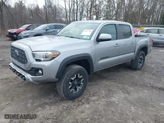 2019 Toyota Tacoma 4WD SR with VIN 5TFCZ5AN8KX168893, listed as a IAAI auction lot 41823745 with 146,557 mi miles. Bid and sale history available at carsss.com. Image 2.