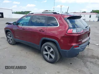 2019 Jeep Cherokee Limited with VIN 1C4PJMDXXKD323087, listed as a IAAI auction lot 42471210 with 57,839 mi miles and . Bid and sale history available at DreamBid. Image 3.