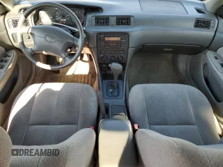 2000 Toyota Camry CE z VIN 4T1BG22K0YU692937, wystawiony jako Copart lot #57456985 z przebiegiem 116 617 mil mil oraz Szkoda całkowita • Salvage title. Historia ofert i sprzedaży dostępna na DreamBid. Obrazek 8.