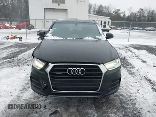2017 Audi Q3 Premium Plus z VIN WA1JCCFS5HR000986, wystawiony jako IAAI lot #41471543 z przebiegiem 68 087 mil mil oraz . Historia ofert i sprzedaży dostępna na DreamBid. Obrazek 12.