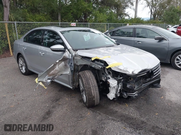 2019 Volkswagen Passat 2.0T Wolfsburg Edition with VIN 1VWLA7A3XKC007385, listed as a IAAI auction lot 41409014 with 36,208 mi miles. Bid and sale history available at carsss.com. Image 1.
