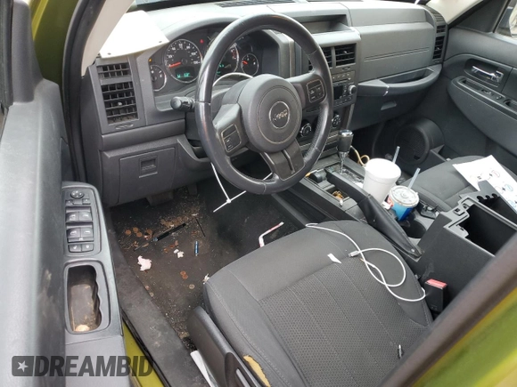2012 Jeep Liberty Sport z VIN 1C4PJMAK4CW146311, wystawiony jako Copart lot #56643515 z przebiegiem 137 432 mil mil oraz Szkoda całkowita • Salvage title. Historia ofert i sprzedaży dostępna na DreamBid. Obrazek 8.