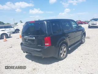 2013 Honda Pilot EX-L with VIN 5FNYF4H69DB024242, listed as a IAAI auction lot 42561279 with 205,611 mi miles and . Bid and sale history available at DreamBid. Image 4.