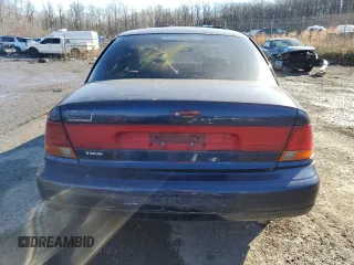 1999 Saturn SL with VIN 1G8ZK5270XZ184042, listed as a Copart auction lot 86827254 with Not Provided miles and Salvage Title. Bid and sale history available at carsss.com. Image 6.