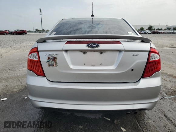 2012 Ford Fusion SE z VIN 3FAHP0HA1CR218938, wystawiony jako Copart lot #59588135 z przebiegiem 111 243 mil mil oraz Szkoda całkowita • Salvage title. Historia ofert i sprzedaży dostępna na DreamBid. Obrazek 6.