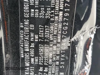 2012 Kia Sorento LX z VIN 5XYKTCA67CG279174, wystawiony jako Copart lot #54363095 z przebiegiem 181 112 mil mil oraz Szkoda całkowita • Salvage title. Historia ofert i sprzedaży dostępna na DreamBid. Obrazek 12.