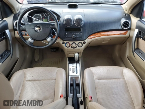 2009 Chevrolet Aveo 2LT z VIN KL1TG66E29B330570, wystawiony jako Copart lot #77913364 z przebiegiem 134 939 mil mil oraz Szkoda całkowita • Salvage title. Historia ofert i sprzedaży dostępna na DreamBid. Obrazek 8.