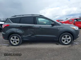 2016 Ford Escape SE with VIN 1FMCU9G92GUC22029, listed as a IAAI auction lot 42032478 with 133,853 mi miles. Bid and sale history available at carsss.com. Image 13.