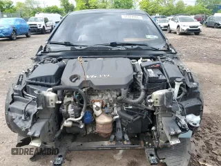 2017 Chevrolet Impala LT z VIN 2G1105S30H9136745, wystawiony jako Copart lot #57324905 z przebiegiem Nie podano mil oraz Szkoda całkowita • Salvage title. Historia ofert i sprzedaży dostępna na DreamBid. Obrazek 5.