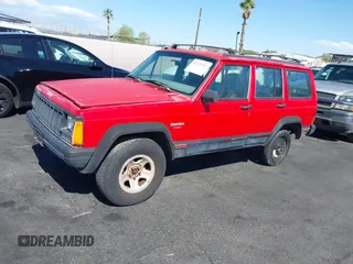 1996 Jeep Cherokee Sport with VIN 1J4FT68S0TL225719, listed as a IAAI auction lot 42121351 with 237,602 mi miles and . Bid and sale history available at DreamBid. Image 12.