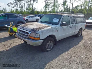 1999 Ford Ranger XL with VIN 1FTYR14V5XPA95547, listed as a IAAI auction lot 41928536 with 119,637 mi miles. Bid and sale history available at carsss.com. Image 2.
