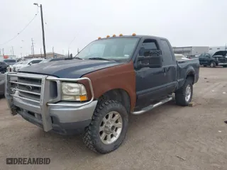 2001 Ford Super Duty F-350 SRW XL with VIN 1FTSX31L21ED36994, listed as a IAAI auction lot 41358290 with 268,344 mi miles. Bid and sale history available at carsss.com. Image 2.