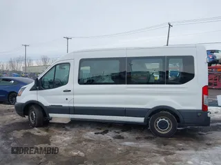 2018 Ford Transit XL z VIN 1FDZX2CM7JKA52904, wystawiony jako IAAI lot #41677165 z przebiegiem 15 201 mil mil oraz . Historia ofert i sprzedaży dostępna na DreamBid. Obrazek 14.
