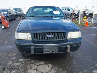 2001 Ford Crown Victoria Police Pkg Police Interceptor with VIN 2FAFP71W81X147404, listed as a IAAI auction lot 41932255 with 108,921 mi miles. Bid and sale history available at carsss.com. Image 6.