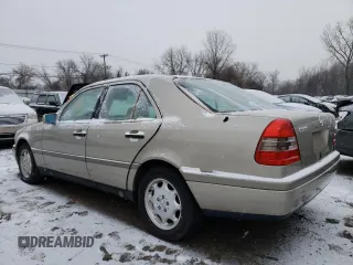 1994 Mercedes-Benz C with VIN WDBHA28E6RF015428, listed as a Copart auction lot 85866784 with Not Provided miles and Salvage Title. Bid and sale history available at carsss.com. Image 2.