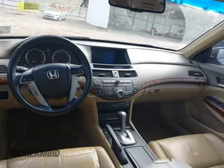 2009 Honda Accord EX-L with VIN 1HGCP36809A026761, listed as a IAAI auction lot 42163300 with 173,652 mi miles and . Bid and sale history available at DreamBid. Image 16.