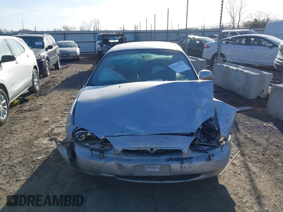 1996 Mercury Sable GS with VIN 1MELM50U5TA633365, listed as a IAAI auction lot 41723519 with 144,067 mi miles. Bid and sale history available at carsss.com. Image 12.