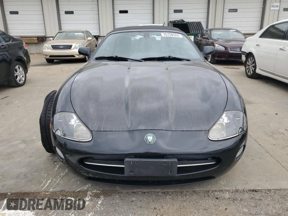 2006 Jaguar XK with VIN SAJDA42C462A44968, listed as a Copart auction lot 75758524 with 77,266 mi miles and Salvage Title. Bid and sale history available at carsss.com. Image 5.