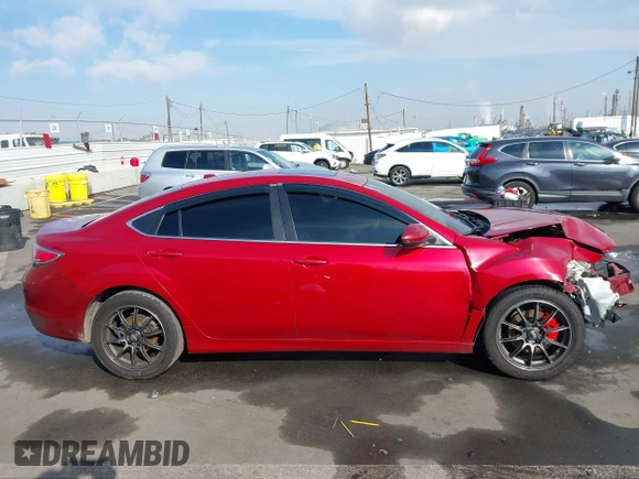 2009 Mazda 6 S Grand Touring with VIN 1YVHP82B795M34101, listed as a IAAI auction lot 41434441 with 125,481 mi miles and . Bid and sale history available at DreamBid. Image 14.
