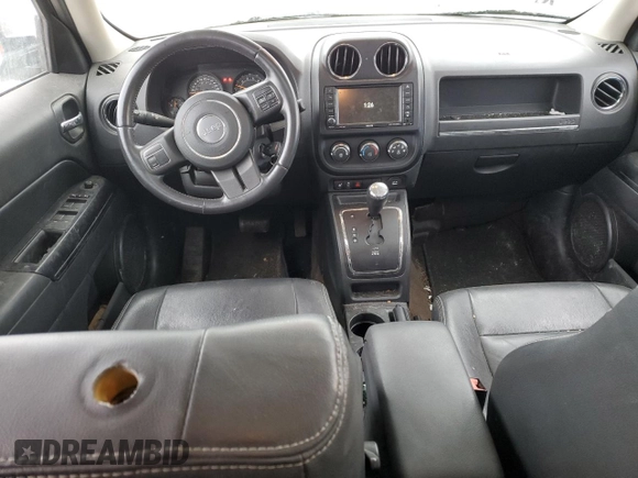 2015 Jeep Patriot North with VIN 1C4NJRAB7FD311725, listed as a Copart auction lot 82647074 with 185,560 mi miles and Salvage Title. Bid and sale history available at carsss.com. Image 8.