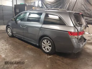 2016 Honda Odyssey EX-L with VIN 5FNRL5H61GB138100, listed as a IAAI auction lot 41548666 with 127,780 mi miles. Bid and sale history available at carsss.com. Image 3.